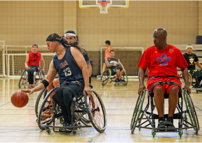 Wheelchair basketball players competing actively on the court.